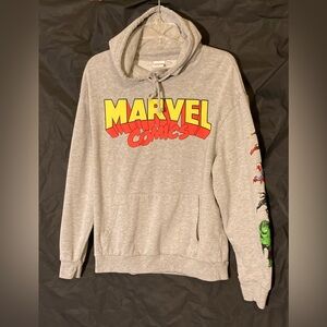 Official Marvel hoodie in size L with colorful graphics.